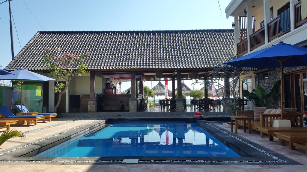 Coral Beach Pizza Cottages Gili Trawangan Extérieur photo