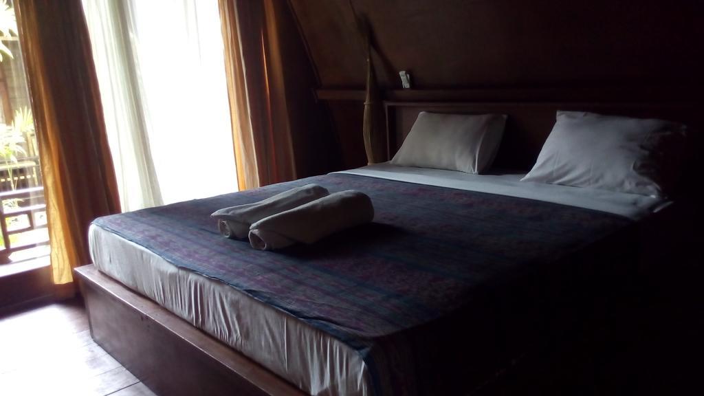 Coral Beach Pizza Cottages Gili Trawangan Extérieur photo